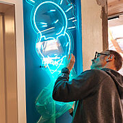 Installing teal LED neon ice-cream light