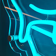 Close-up teal LED neon icecream light